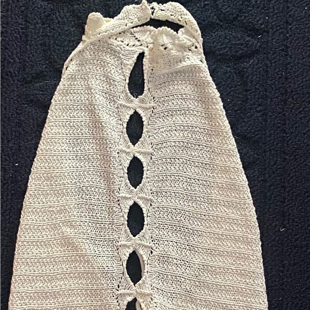 Fun halter with open back. Size M/L. Very stylish